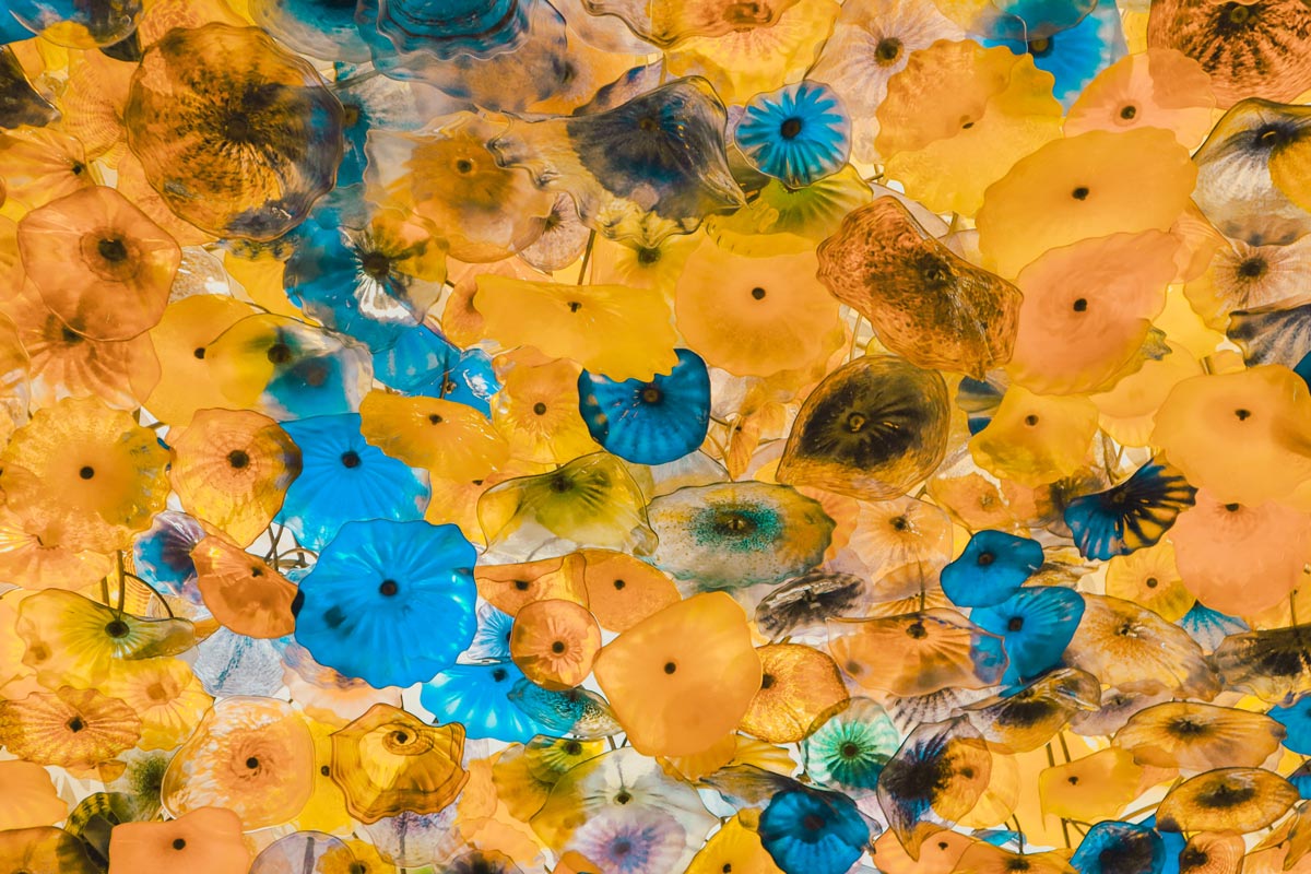 Blue and yellow glass flower petals.